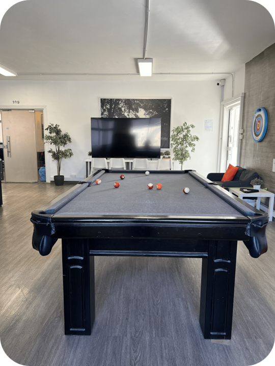 Pool table at Rawaq Cowork House